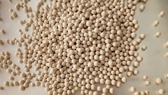 Tan particles in a pile.