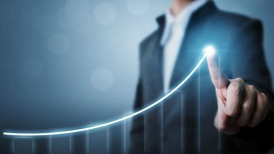 Businessman pointing arrow graph corporate future growth plan stock photo