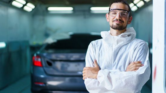 lifestyle, global water, onsite
Worker in paint suit in automotive paint spray booth