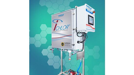 Industrial equipment labeled 'iChlor® Monochloramine Technology' with a touchscreen control panel, set against a blue-green hexagonal background.